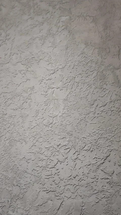 Decorative Light Projection on Textured Gray Wall. Stock Footage 341396197