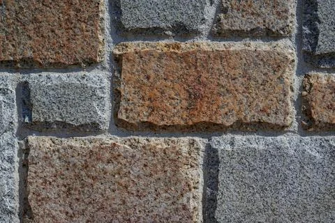 Decorative light stone wall close-up Stock Photos