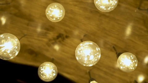 Decorative lighting and glowing lamp on ceiling. Bright glowing light from Video stock 101769444