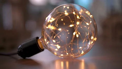 Decorative Lighting Bulb Turns On Stock Footage 136724918