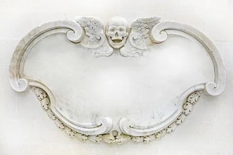 Decorative marble frame with a skull on top, baroque style, mockup for insc.. Stock Photos