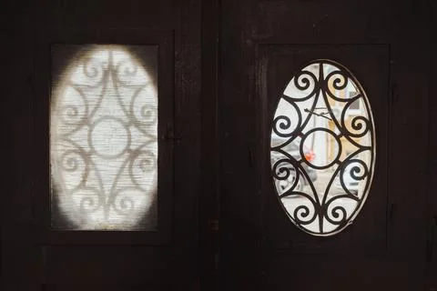 Decorative metal frames on old doors Stock Photos