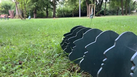 Decorative Metal Garden Sculptures Installed in Park Lawn Stock Footage 341280853