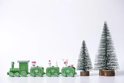 Decorative mini christmas tree and train isolated on white background Stock Photos