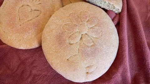 Decorative Moroccan flatbread (a mixture of natural yeast, whole wheat flour and Stock Photos