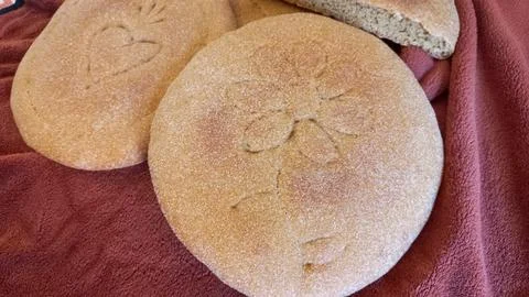 Decorative Moroccan flatbread (a mixture of natural yeast, whole wheat flour and Stock Photos