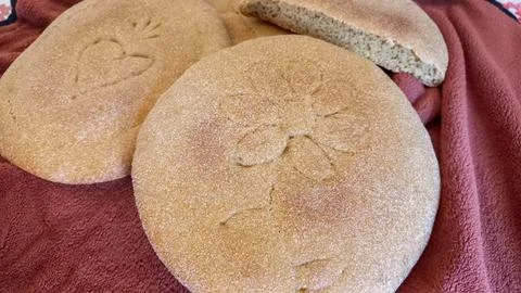 Decorative Moroccan flatbread (a mixture of natural yeast, whole wheat flour and Stock Photos