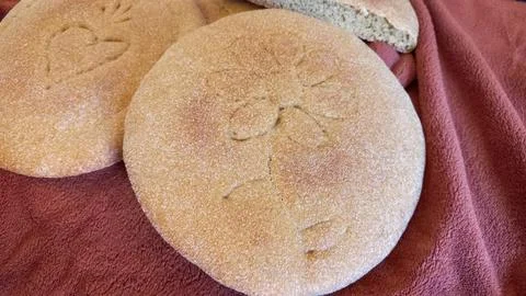 Decorative Moroccan flatbread (a mixture of natural yeast, whole wheat flour and Stock Photos