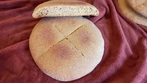 Decorative Moroccan flatbread (a mixture of natural yeast, whole wheat flour and Stock Photos