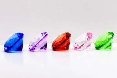 Decorative multi-colored crystals on a white background Foto stock