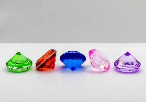 Decorative multi-colored crystals on a white background Foto stock