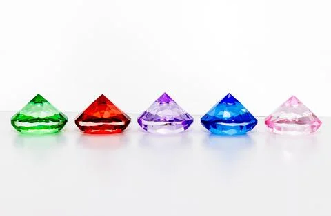 Decorative multi-colored crystals on a white background Foto stock