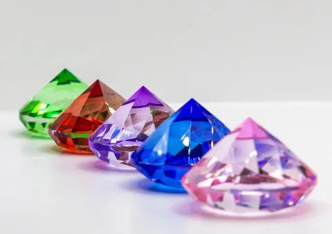 Decorative multi-colored crystals on a white background Foto stock