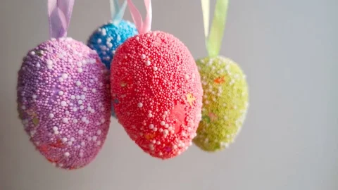 Decorative multicolored Easter eggs sway slightly Stock Footage 105926160