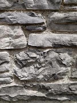 Decorative natural stone wall texture background. Decorative stone masonry .. Stock Photos
