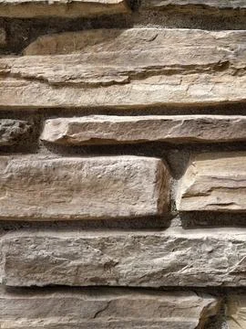 Decorative natural stone wall texture background. Decorative stone masonry .. Stock Photos