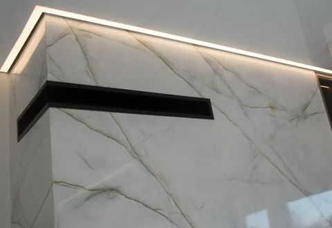 Decorative niche with backlight on the wall under the marble Stock Photos