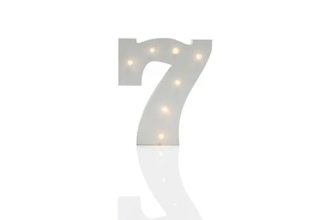 Decorative Number 7 with Embedded LED Lights Over White Background Stock Photos