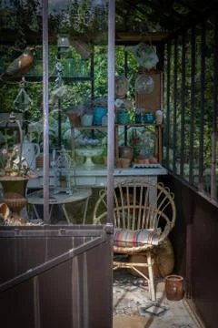 Decorative objects and plants in a veranda Stock Photos