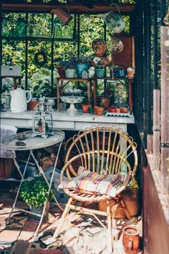 Decorative objects and plants in a veranda Stock Photos