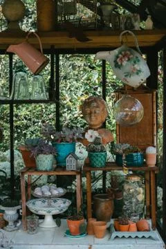 Decorative objects and plants in a veranda Stock Photos