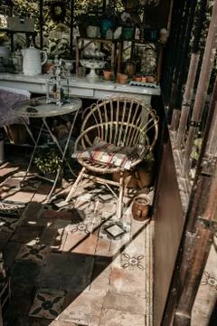 Decorative objects and plants in a veranda Stock Photos