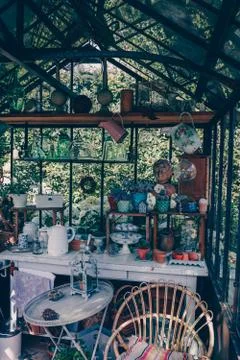 Decorative objects and plants in a veranda Stock Photos