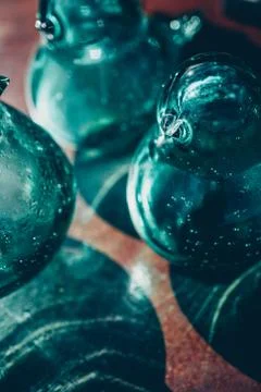 Decorative objects in blown glass on a table outdoor Stock Photos