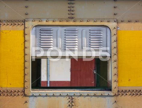 Decorative old metal window with old train Stock Photos