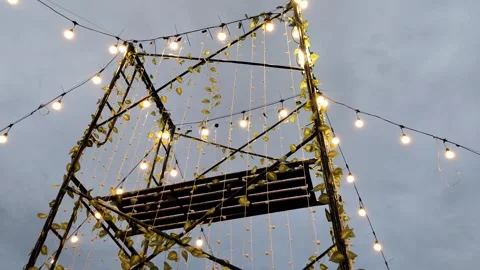 Decorative Outdoor Lighting with String Bulbs on Wooden Structure Video stock 304617004