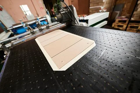 Decorative packaging production process showcasing box lid blanks on the Stock Photos