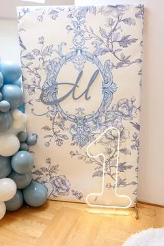 Decorative panel with number one and floral ornament for a child's first birt Stock Photos