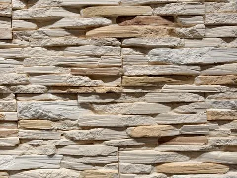 Decorative panels replicating brick stone and tile patterns shown in a cons.. Stock Photos