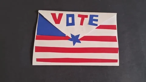 Decorative paper envelope craft with vote text motion video clip Stock Footage 341700602