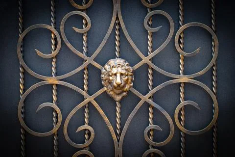 Decorative parts of metal gates, elements of hand forging Stock Photos