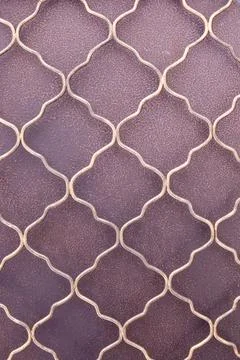 Decorative pattern on an elegant metal grill showcasing craftsmanship and a.. Stock Photos