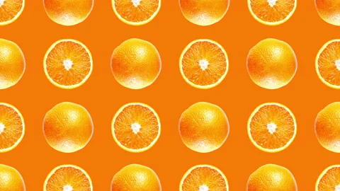 Decorative pattern made of cut and whole juicy orange fruits Stock Footage 148266628