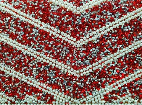 Decorative pattern of rhinestones with beads Stock Photos