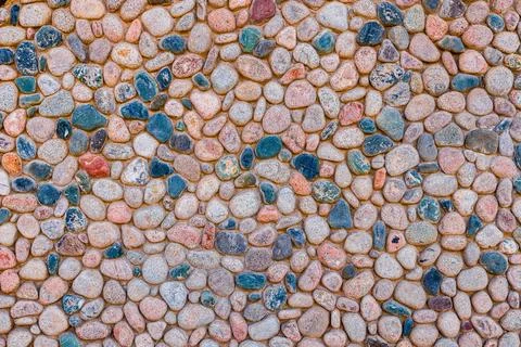 Decorative pebble wall texture Stock Photos