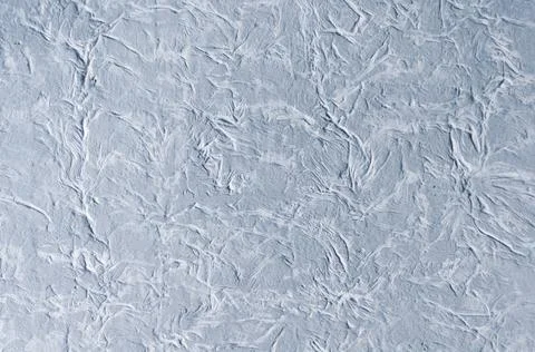 Decorative plaster on wall, textured background close up Stock Photos