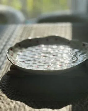 Decorative Plate with Light Reflection Stock Photos