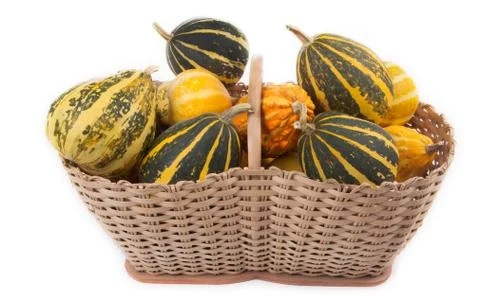 Decorative pumpkins in basket Foto stock