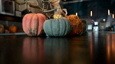 Decorative pumpkins on a table in a hotel Stock Footage 290776289