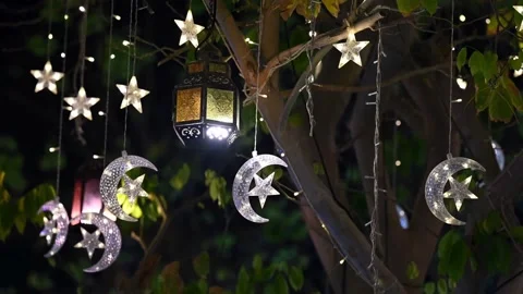 Decorative Ramadan lantern with hanging moon and star lights Stock Footage 334137345