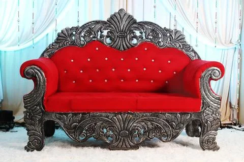 Decorative red sofa Stock Photos