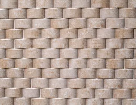 Decorative relief cladding slabs imitating cylinders on wall Foto stock