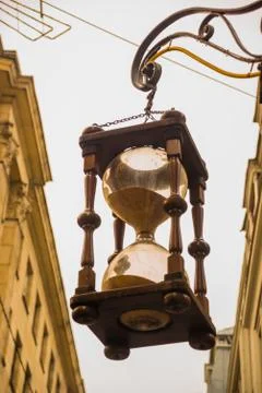 Decorative sand-clock in old Riga city, Latvia. Riga is the capital and large Stock Photos