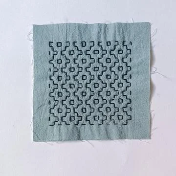 Decorative Sashiko Sampler Isolated on Light Background.  Stock Photos