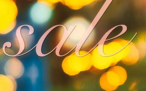 Decorative script sale text overlay on blurred bokeh lights background Stock Photos