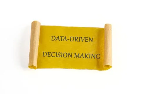 A decorative scroll displays the phrase data-driven decision making prominent Foto stock